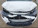 Toyota Corolla Hybrid Le JTDEBRBE4LJ028542 photo
