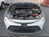 Toyota Corolla Hybrid Le JTDEAMDEXMJ011782 photo