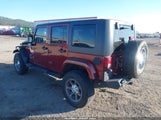 Jeep Wrangler Unlimited Sahara 1J4BA5H19AL104450 fotografie