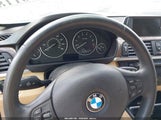 BMW 320I WBA3B1G57FNT03736 photo