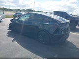 Tesla Model Y Long Range Dual Motor All-Wheel Drive 7SAYGDEDXTA471015 photo