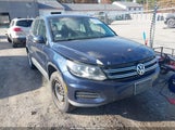 Volkswagen Tiguan S WVGCV7AX2CW598558 снимка