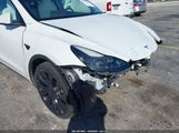 Tesla Model Y Performance Dual Motor All-Wheel Drive 7SAYGDEF7PF602945 photo