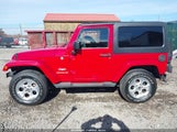 Jeep Wrangler Sahara 1J4AA5D17BL592459 снимка