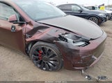 Tesla Model Y Performance Dual Motor All-Wheel Drive 7SAYGDEF9RA265727 photo