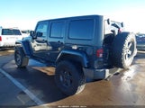 Jeep Wrangler Unlimited Freedom 1C4HJWDG7GL201316 photo