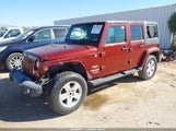 Jeep Wrangler Unlimited Sahara 1J4BA5H16AL156621 photo