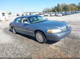 Lincoln Town Car Signature 1LNHM81W34Y635306 photo