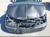 Lincoln Town Car Signature 1LNHM82W1XY662927 снимка
