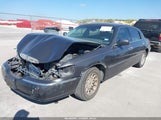 Lincoln Town Car Signature 1LNHM82W1XY662927 снимка