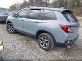 Honda Passport Awd Trailsport 5FNYF8H69PB020994 fotografie