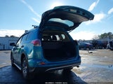 Toyota Rav4 Hybrid Xle JTMRJREV8GD031139 photo