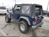 Jeep Wrangler X 1J4FA39S94P799653 снимка