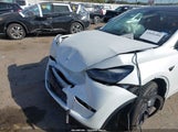 Tesla Model Y Performance Dual Motor All-Wheel Drive 7SAYGDEF9PF665514 photo