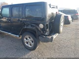 Jeep Wrangler Unlimited Sahara 1C4BJWEG1FL715875 снимка