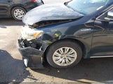 Toyota Camry Hybrid Le 4T1BD1FK7EU104007 photo