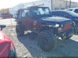 Jeep Wrangler Sport 1J4FA49S5YP776043 снимка