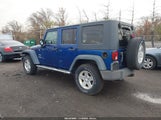 Jeep Wrangler Unlimited Sport 1J4BA3H11AL135731 снимка