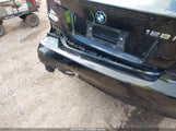BMW 128I WBAUL7C55DVU08427 photo