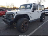 Jeep Wrangler Unlimited Freedom Edition 1C4HJWDG2DL569561 снимка
