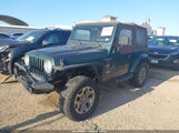 Jeep Wrangler Sahara 1J4FY49S2XP447164 снимка