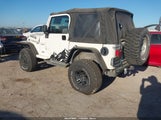 Jeep Wrangler Sport 1J4FA49SX4P802341 снимка