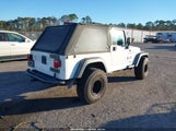 Jeep Wrangler Unlimited 1J4FA44S25P317040 снимка