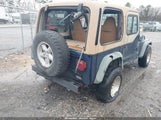 Jeep Wrangler Sport 1J4FA49S9YP719506 снимка