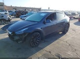 Tesla Model Y Performance Dual Motor All-Wheel Drive 7SAYGDEF2PF634220 photo
