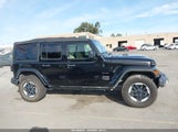 Jeep Wrangler Unlimited Sahara 4X4 1C4HJXEG7JW308120 снимка