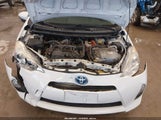 Toyota Prius C One JTDKDTB37E1571430 снимка