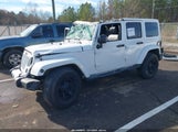 Jeep Wrangler Unlimited Sahara 1C4HJWEG6EL142531 fotografie