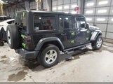 Jeep Wrangler 4-Door Sport S 4X4 1C4HJXDG0PW567283 снимка