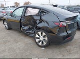 Tesla Model Y Long Range Dual Motor All-Wheel Drive 7SAYGDEE0RF984228 photo
