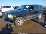 Jeep Grand Cherokee Laredo 1J8GR48KX8C165638 photo