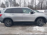 Honda Passport Awd Ex-L 5FNYF8H50MB003570 photo