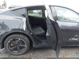Tesla Model Y Premium Rear-Wheel Drive 7SAYGDED7TF423488 photo