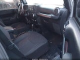Jeep Wrangler Unlimited Sport 1C4BJWDGXDL553856 снимка