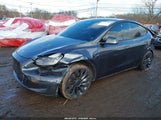 Tesla Model Y Performance Dual Motor All-Wheel Drive 7SAYGDEF7RA277486 photo