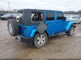 Jeep Wrangler Unlimited Sahara 1J4BA5H19AL184803 снимка