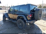 Jeep Wrangler 4-Door High Tide 4X4 1C4HJXDG3PW692407 photo