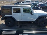 Jeep Wrangler Unlimited Sport 1C4HJWDG7GL283435 photo