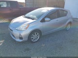 Toyota Prius C Three JTDKDTB33C1017332 снимка