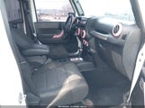 Jeep Wrangler Unlimited Sport 1C4BJWDG0CL138432 снимка