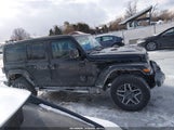 Jeep Wrangler 4-Door Sahara 4X4 1C4PJXEN1SW549893 photo