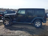 Jeep Wrangler Unlimited Sport 1C4HJWDG0EL252296 fotografie