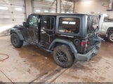 Jeep Wrangler 4-Door Sport S 4X4 1C4PJXDN4RW104446 photo