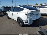 Tesla Model Y Long Range Dual Motor All-Wheel Drive/Performance Dual Motor All-Wheel Drive 5YJYGDEF7LF001963 photo