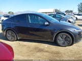 Tesla Model Y Premium Rear-Wheel Drive/Standard Rear-Wheel Drive 7SAYGDED1TF427181 photo