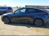 Tesla Model Y Premium Rear-Wheel Drive/Standard Rear-Wheel Drive 7SAYGDED1TF427181 photo